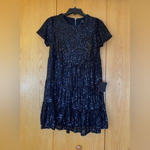 Lulus black sequins mini dress with sleeves! Sold out on website. Size small.